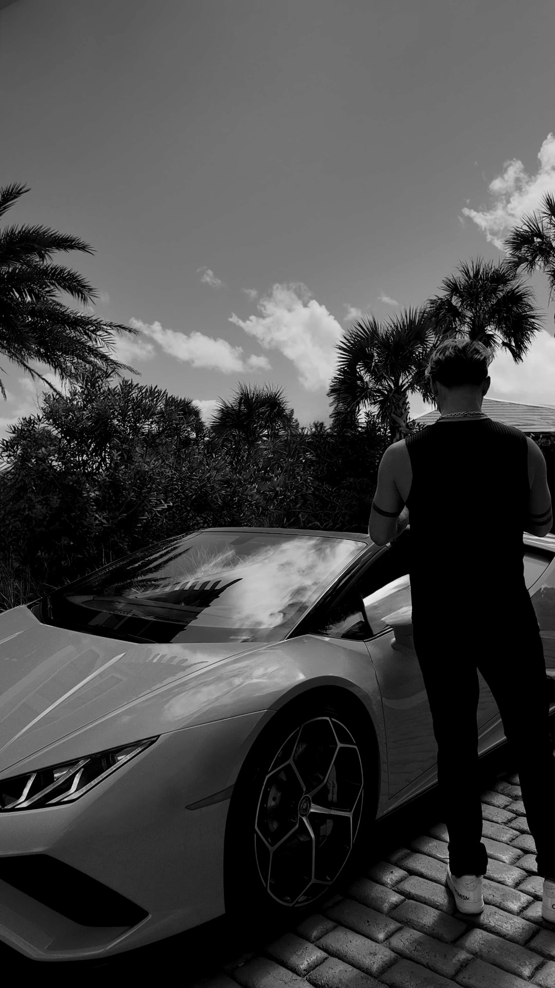 Trevor Thomas photographed outdoors in Florida, black and white