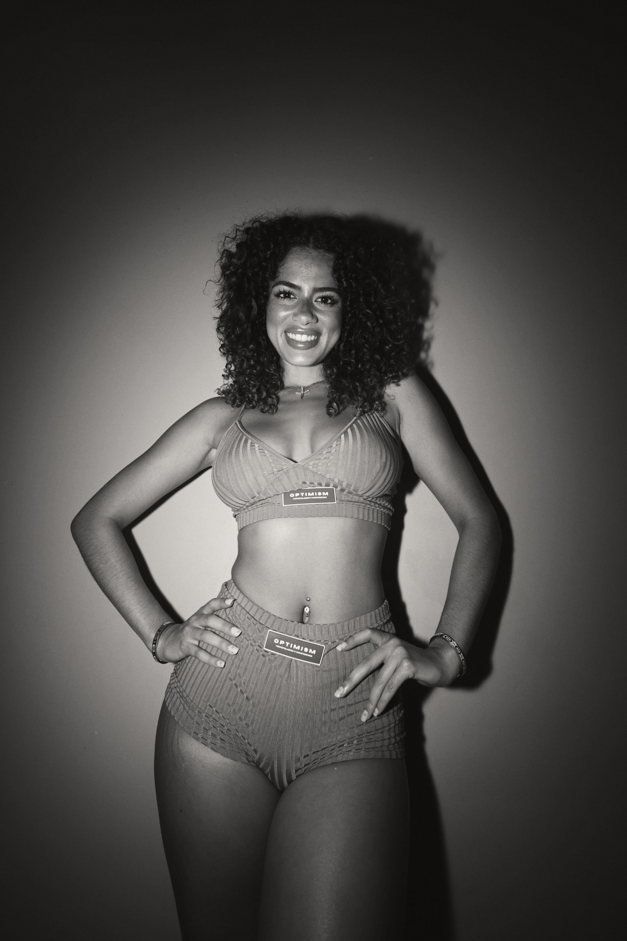 OPTIMISM. archive — Ribbed bralette and high-waist brief. Hard light, hard shadow.