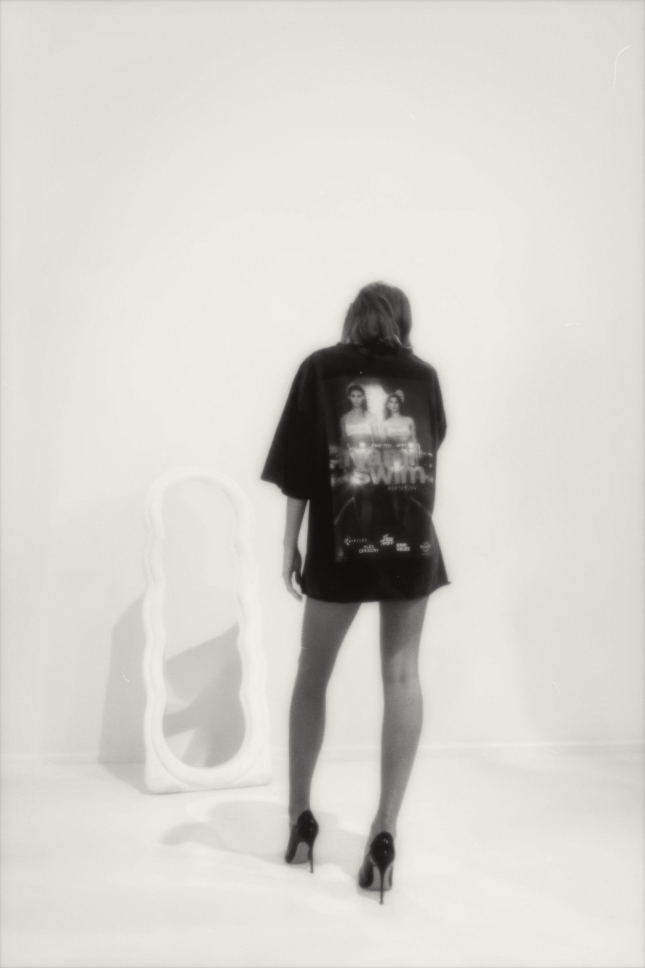 OPTIMISM. archive — Miami Swim Week artifact. Back print, mirror and soft focus.
