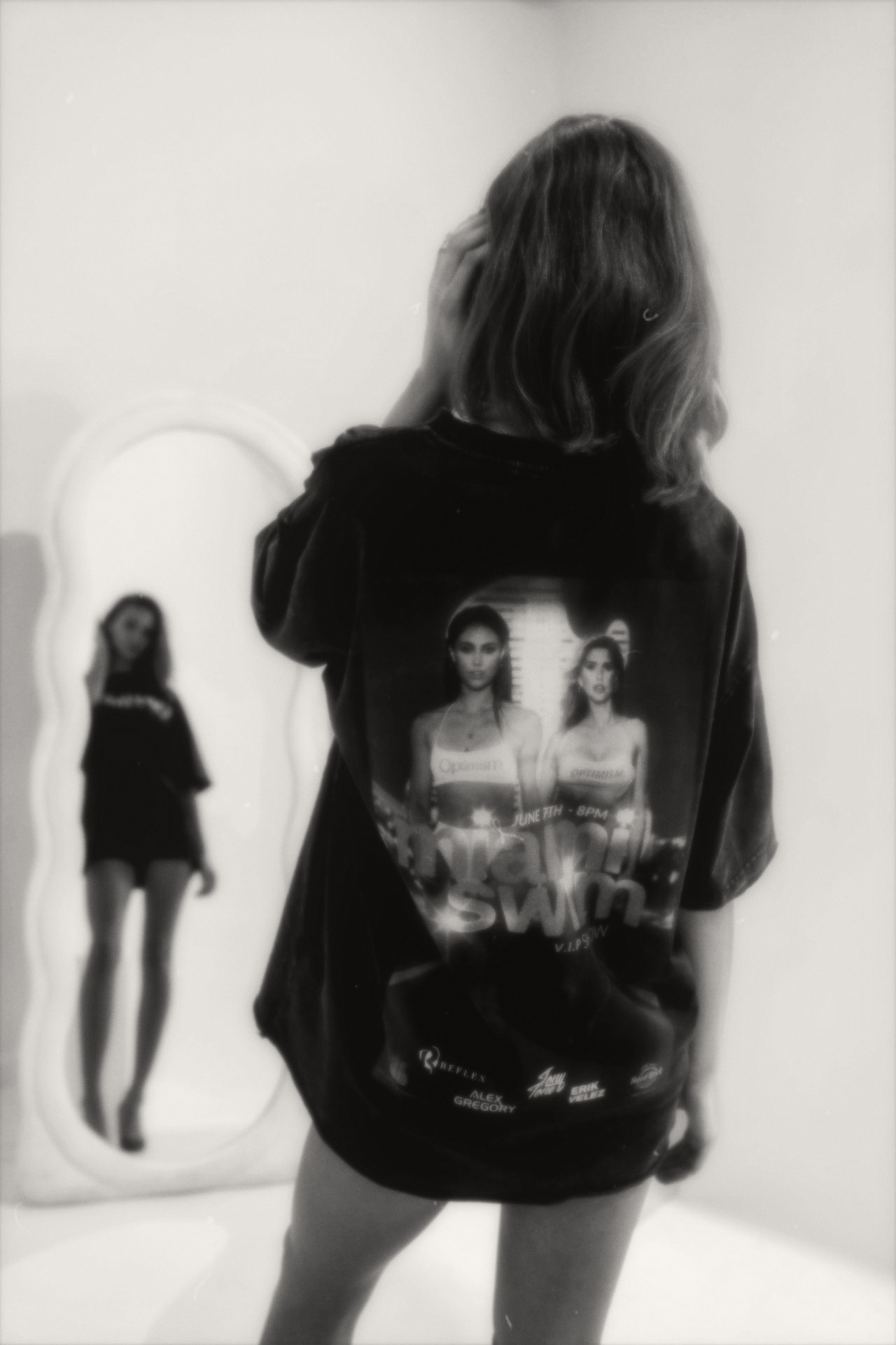 OPTIMISM. archive — Miami Swim Week artifact. The room reflected behind.